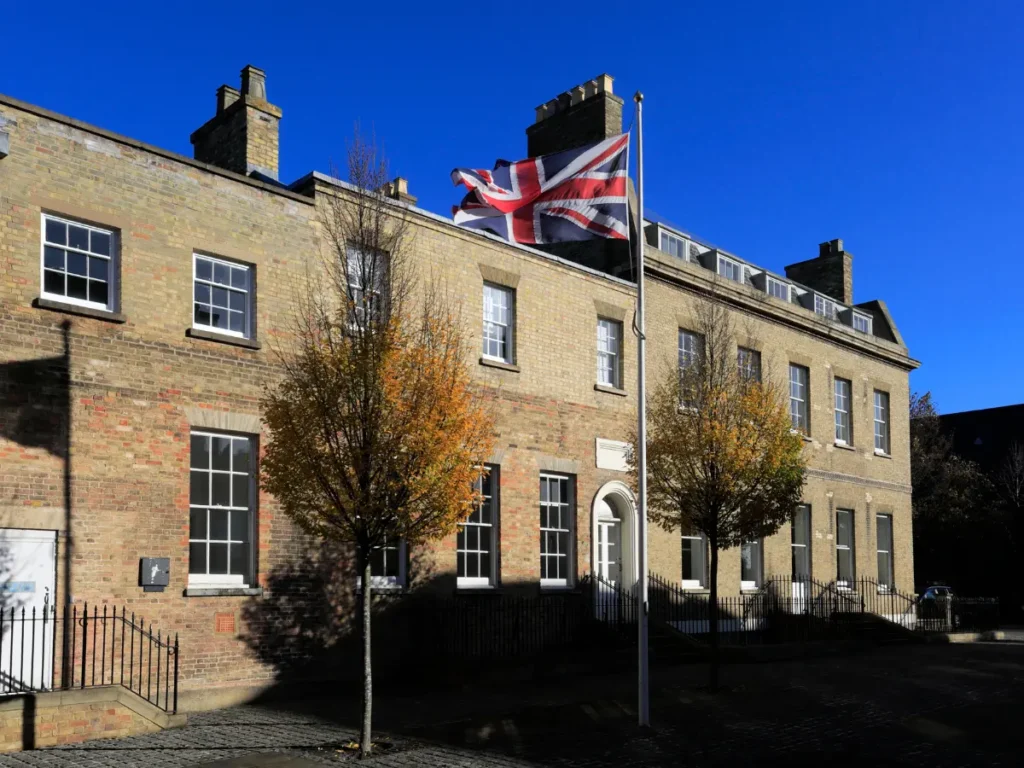 County hall building with Union Jack flag in Huntingdon, Cambridgeshire.